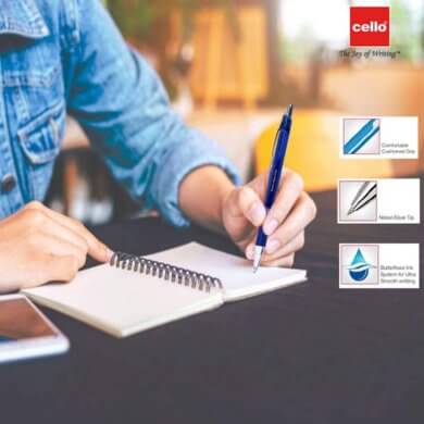 Person writing in a notebook with a Cello pen, showcasing Cello's commitment to quality writing instruments.