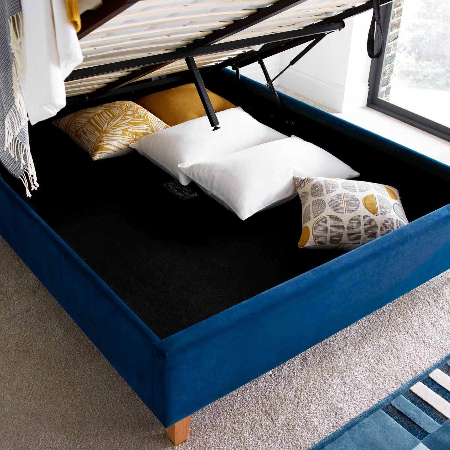 Kingham Blue Velvet Ottoman Bed