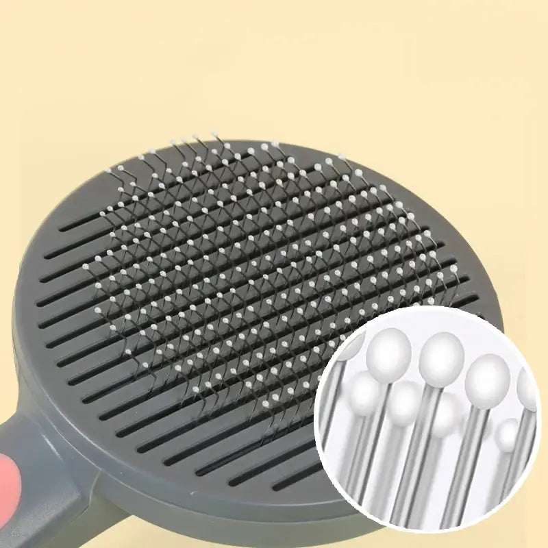 Pet grooming brush with self-cleaning comb and close-up of bristle tips, ideal for cats, dogs, and rabbits.